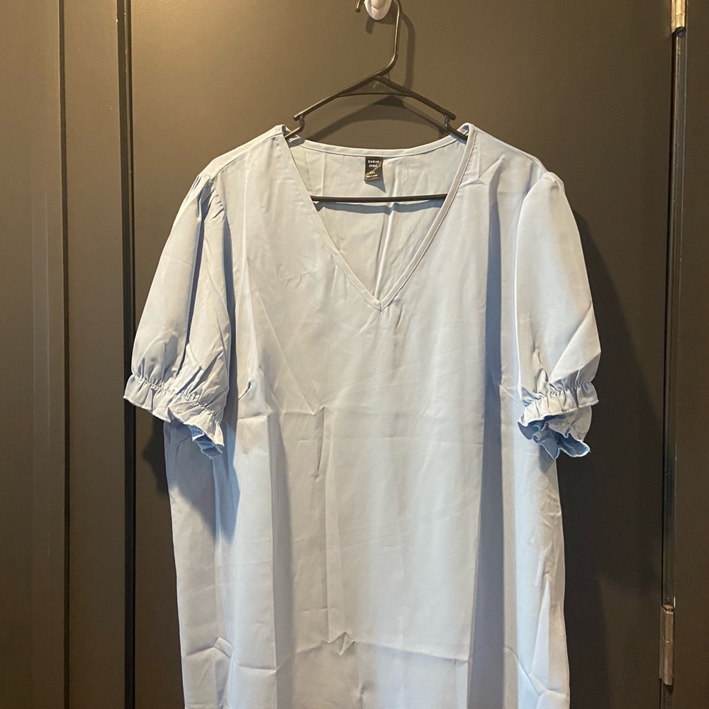 Never been worn bright blue blouse